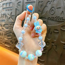 Dísz a táskához és a telefonhoz Labubu - több változatban