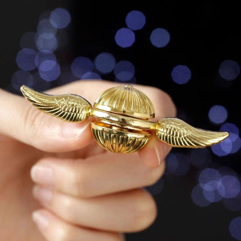 Fidget spinner Harry Potter arany cikesz - több változatban